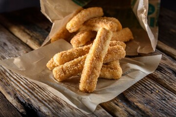 Crispy and Zesty: Panko-Breaded Fish Sticks with Lemon in Exquisite 4K Close-U