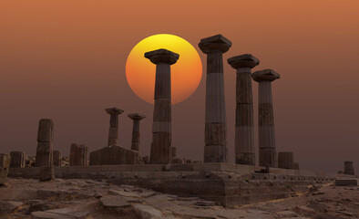 The Temple of Athena in the archaeological site of ancient city of Assos at sunset - Behramkale, Turkey