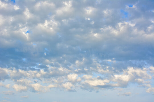 A white and blue clouds in the sky in the evening 
