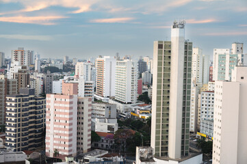Obraz premium Campinas, Sao Paulo, Brazil. June 23, 2023. Aerial image of three central districts of Campinas: Vila Itapura, Cambuí and Jardim Guanabara. Sunset and blue sky.