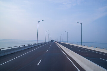 Padma Bridg Highway asphalt with blue sky Background. Perspective view