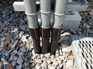 HDPE pipe connected with a steel pipe: fittings for electrical conduit and cable protection in switchyard.