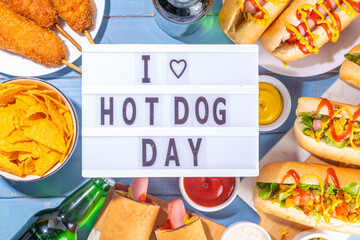 National Hot Dogs day background, hotdog summer party festival foods, Various type of traditional...