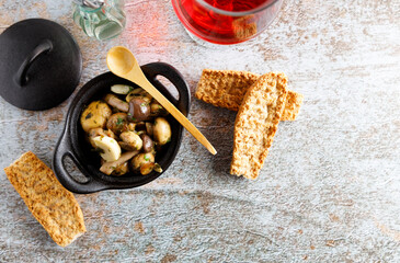 Mushrooms in garlic butter sauce.