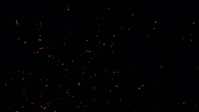 Abstract loop glow fire particles ash sparks rising up with transparent alpha channel can be used for overlay your project. 4K 3D chaotic motion of fiery orange glowing flying ember burning 