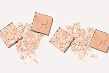 Set crushed light beige foundation powder cosmetics swatches. Makeup powder texture on beige background. Nude broken eye shadows. Aesthetic flat lay, skin tone face cosmetic product sample