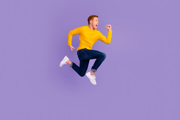 Fototapeta na wymiar Full length profile photo of cheerful man run look empty space isolated on violet color background