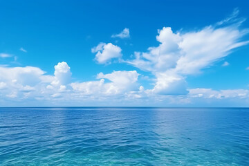 Obraz premium Calming summer natural marine blue background . sea and sky with white clouds photography