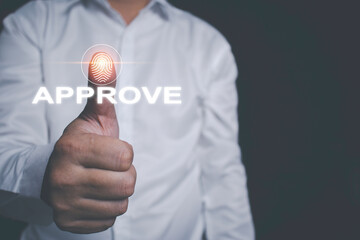Businessman touching fingerprint icon with own finger which is the process of signing the name...