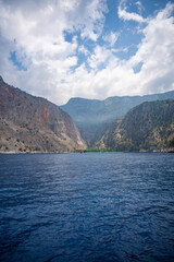 Fototapeta premium View from water of Butterfly Valley in Oludeniz Fethiye in the morning, Turkey