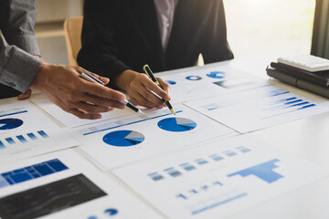 Business meeting, discuss business growth chart analysis, sales and plan investment strategy.