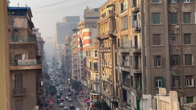 Cairo, Egypt - 2023: typical egyptian architecture buildings and street view panorama in old Cairo with car traffic. Residential area and homes in Africa metropolis city Cairo