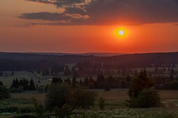 Color evening meadow near Bozi Dar village with sunshine