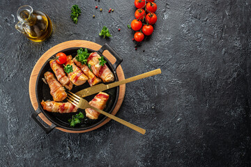 chicken breast wrapped with bacon in pan. Healthy fats, clean eating for weight loss. place for...