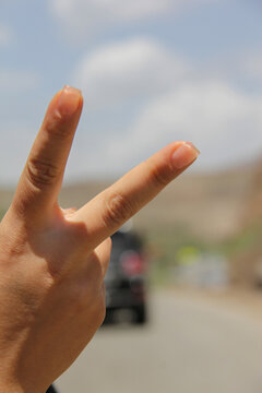 Sign of Victory - during out trip to north of IRAN one traveler sign by her hand