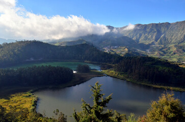Fototapeta na wymiar Telaga Warna Lake & Pengilon Lake at Dieng Plateau with blue sky