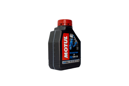 Motul scooter engine oil on a white background
