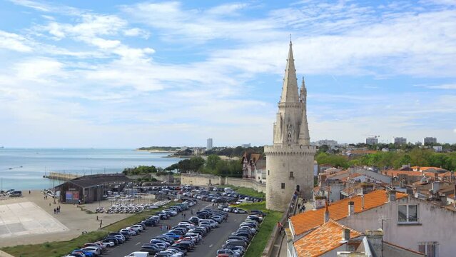 Tour de la Lanterne tower and car park on a sunny day in La Rochelle, France