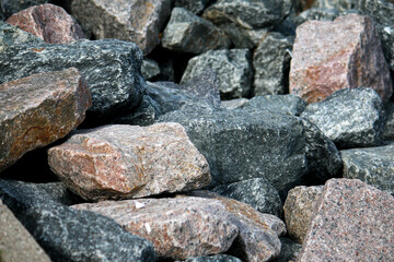Fototapeta na wymiar close up of a heap of different cobblestones