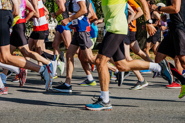 large group athletes runners run together marathon race, sports summer games