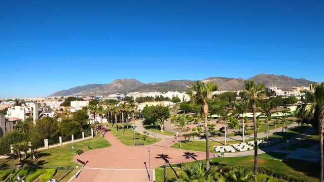Walking in Parque de la Bateria in Torremolinos, Spain on April 26, 2023