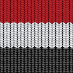 Flag of Yemen on a braided rop.