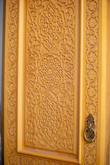 Fototapeta na wymiar wooden door design for home in uzbekistan
