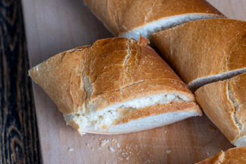 pieces of soft baguette on a cutting board