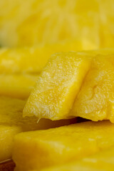 sliced ripe yellow pineapple, a large number of pieces