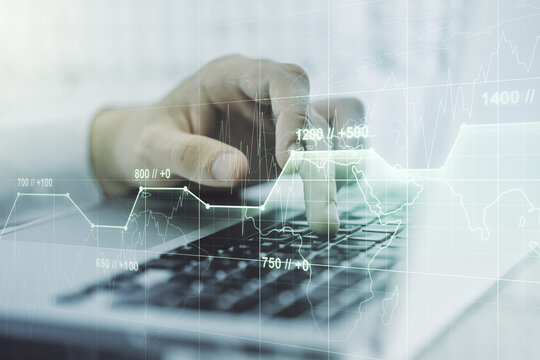 Multi exposure of creative statistics data hologram with hands typing on computer keyboard on background, stats and analytics concept