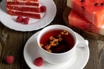 Red cake with cream and raspberry flavor