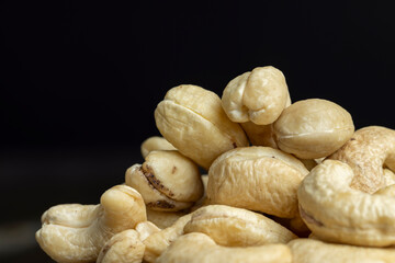 Fresh peeled cashew nuts on the table