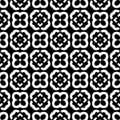 Geometric pattern in ethnic style. Seamless background  with  abstract shapes. Black and white wallpaper. Abstract background  with Repeating pattern for decor, textile and fabric.