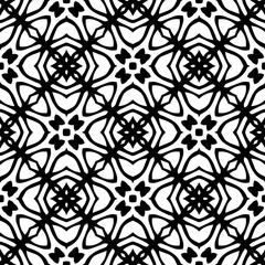 Geometric pattern in ethnic style. Seamless background  with  abstract shapes. Black and white wallpaper. Abstract background  with Repeating pattern for decor, textile and fabric.