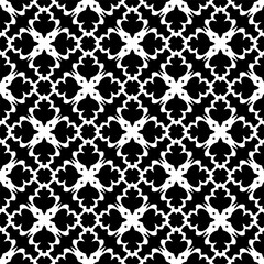 Geometric pattern in ethnic style. Seamless background  with  abstract shapes. Black and white wallpaper. Abstract background  with Repeating pattern for decor, textile and fabric.
