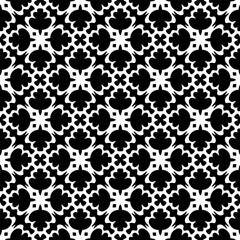 Geometric pattern in ethnic style. Seamless background  with  abstract shapes. Black and white wallpaper. Abstract background  with Repeating pattern for decor, textile and fabric.