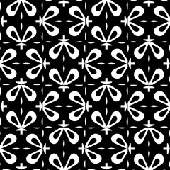 Geometric pattern in ethnic style. Seamless ornament  with  abstract shapes. Black and white wallpaper. Abstract background  with Repeating pattern for decor, textile and fabric.