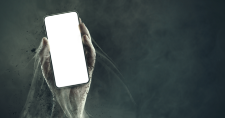 Zombie hand holding a smartphone