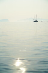 Single sailing boat on the Aegean Sea near the island of Spetses