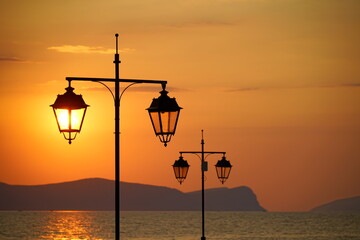 Aegean Sea, sunrise, Island, lamp, streetlight, lantern, dawn, sky, sun, clouds, silhouette, nature, energy, landscape, electricity, power, light, sea, cloud, night, summer, water, orange, beach, stre