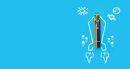 Banner colored pencils and sketch drawing of a rocket and stars taking off on blue background. Back to school concept.