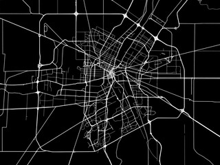 Vector road map of the city of  Winnipeg Manitoba in Canada with white roads on a black background.