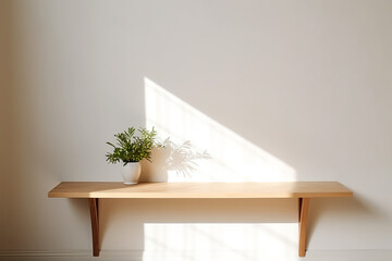 Table shadow background. Wooden table and white empty wall with plant shadows