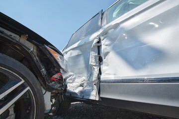 Cars crashed heavily in road accident after collision on city street. Road safety and insurance...