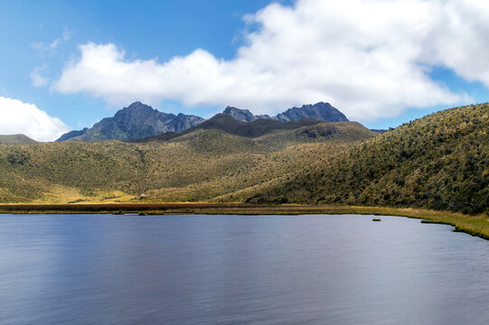 Ruminahui volcano in the background with the Limpiopungo lagoon in the foreground, on a beautiful summer morning. Cotopaxi National Park, Ecuador.