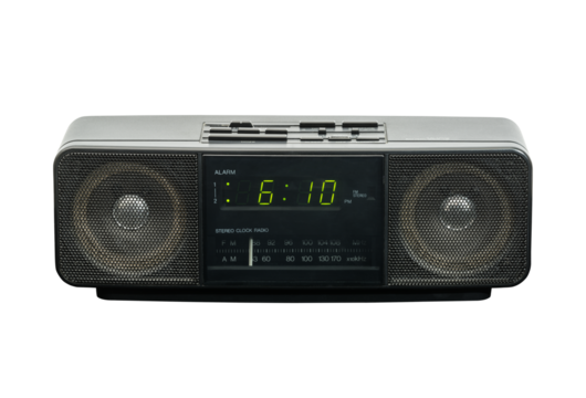 Vintage stereo clock radio isolated with cut out background.