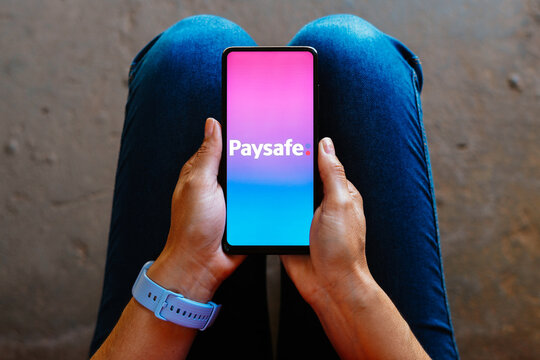 June 26, 2023, Brazil. In this photo illustration, the Paysafe logo is displayed on a smartphone mobile screen.