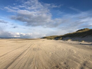 sand dunes and clouds