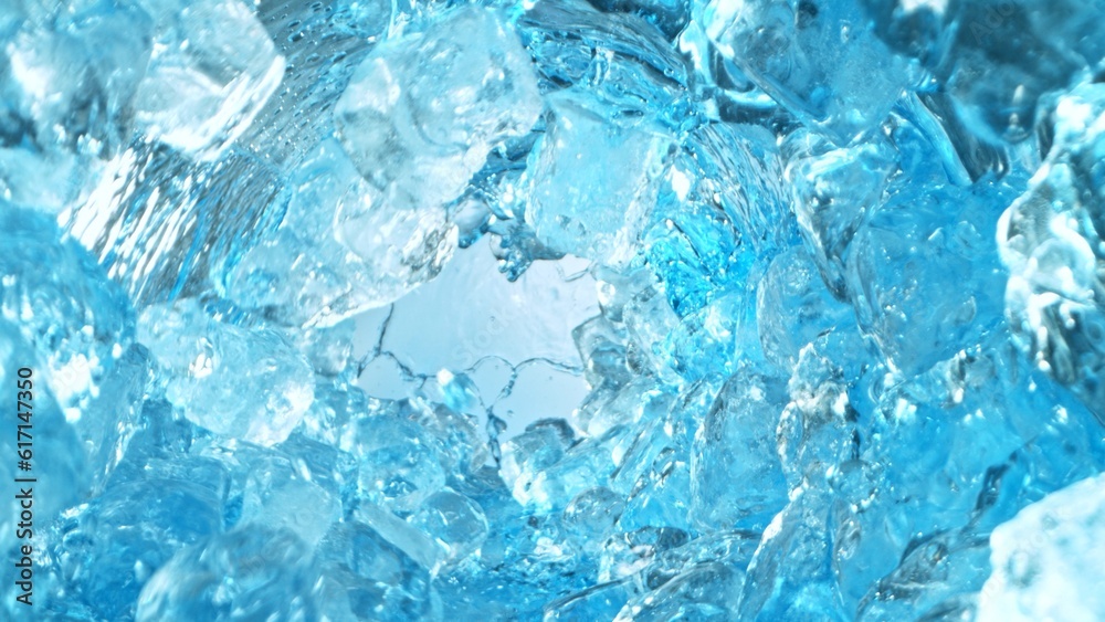 Aufkleber texture of splashing water with ice cubes, tunnel shape.