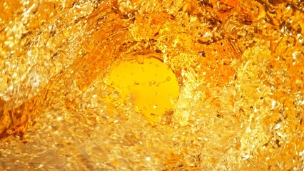 Texture of splashing whiskey surface, tunnel shape.